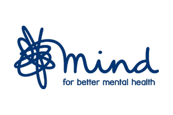 mind two men in building yard with hard hats, shaking hands